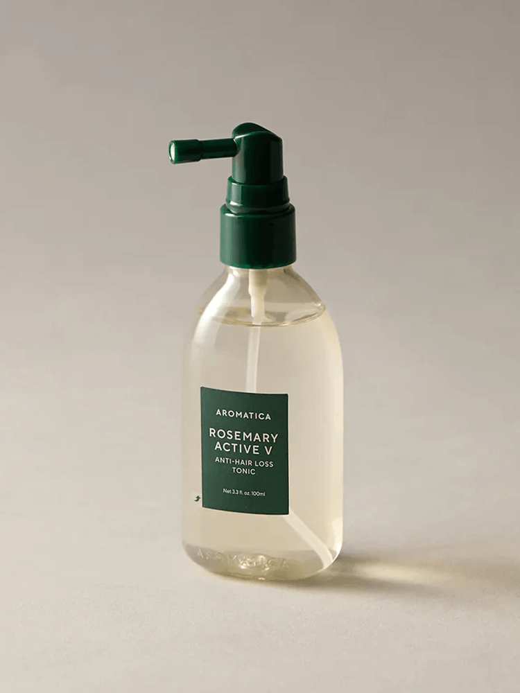 AROMATICA Rosemary Active V Anti-Hair Loss Tonic in a clear bottle with a pump dispenser on a neutral background.