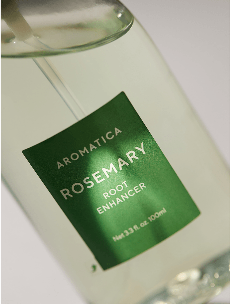 AROMATICA Rosemary Root Enhancer 100ml bottle showcasing its vibrant green label and clear liquid.