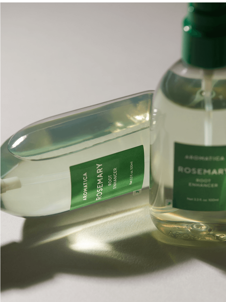 AROMATICA Rosemary Root Enhancer 100ml bottles showcasing a nourishing scalp tonic for vitality.