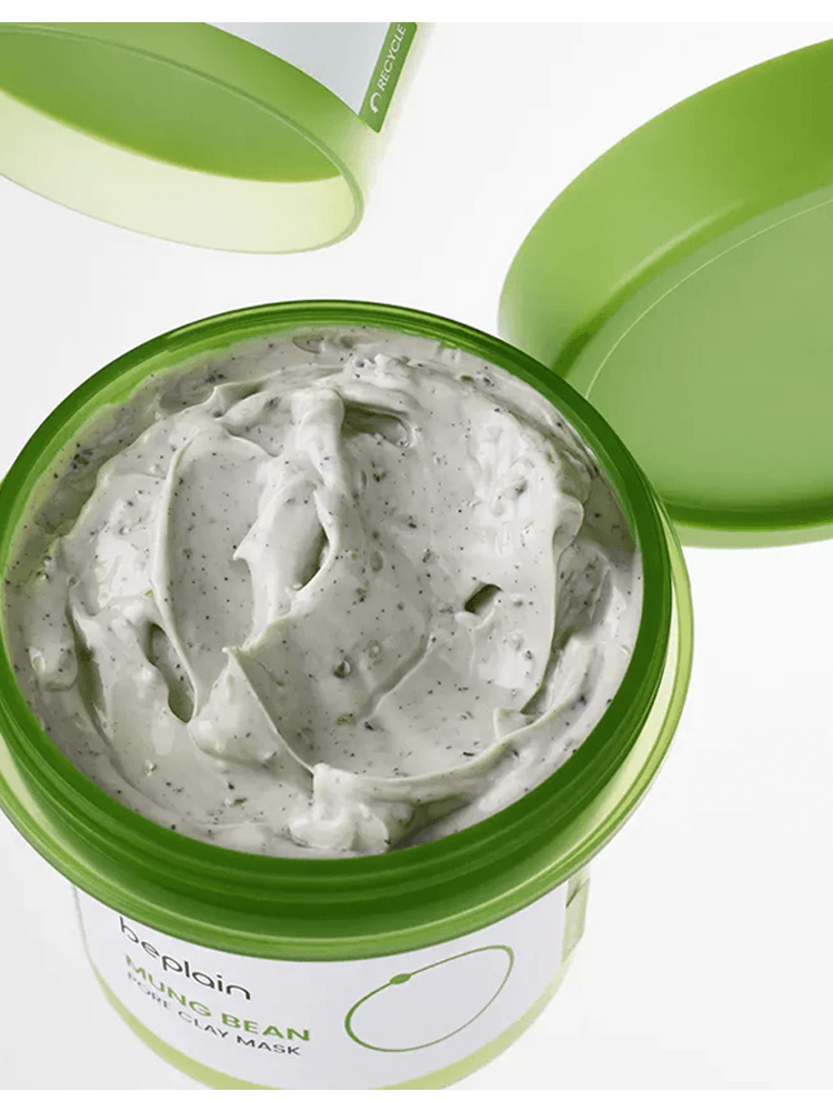 Close-up of BEPLAIN Mung Bean Pore Clay Mask in green jar, showcasing the creamy texture.