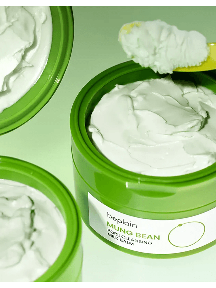 BEPLAIN Mung Bean Pore Cleansing Milk Balm in a green jar with creamy texture and a small spatula.