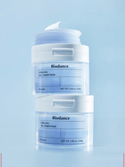BIODANCE Cera-nol Gel Toner Pads product image showcasing two jars with pads on a light blue background.