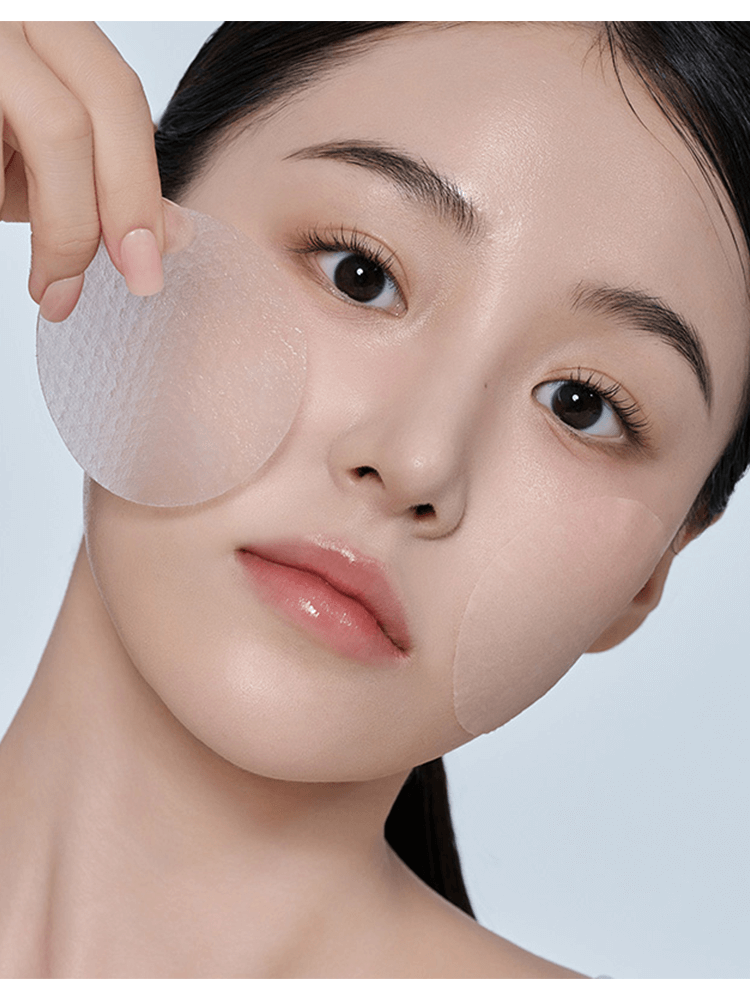 Woman applying BIODANCE Collagen Gel Toner Pads on her face, highlighting skin hydration and care.