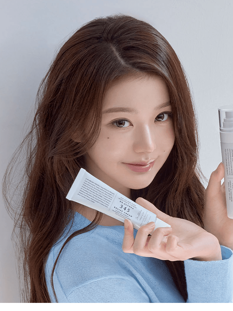 Young woman holding Dr.Althea 345 Relief Cream 50ml, showcasing skincare benefits for acne-prone skin.