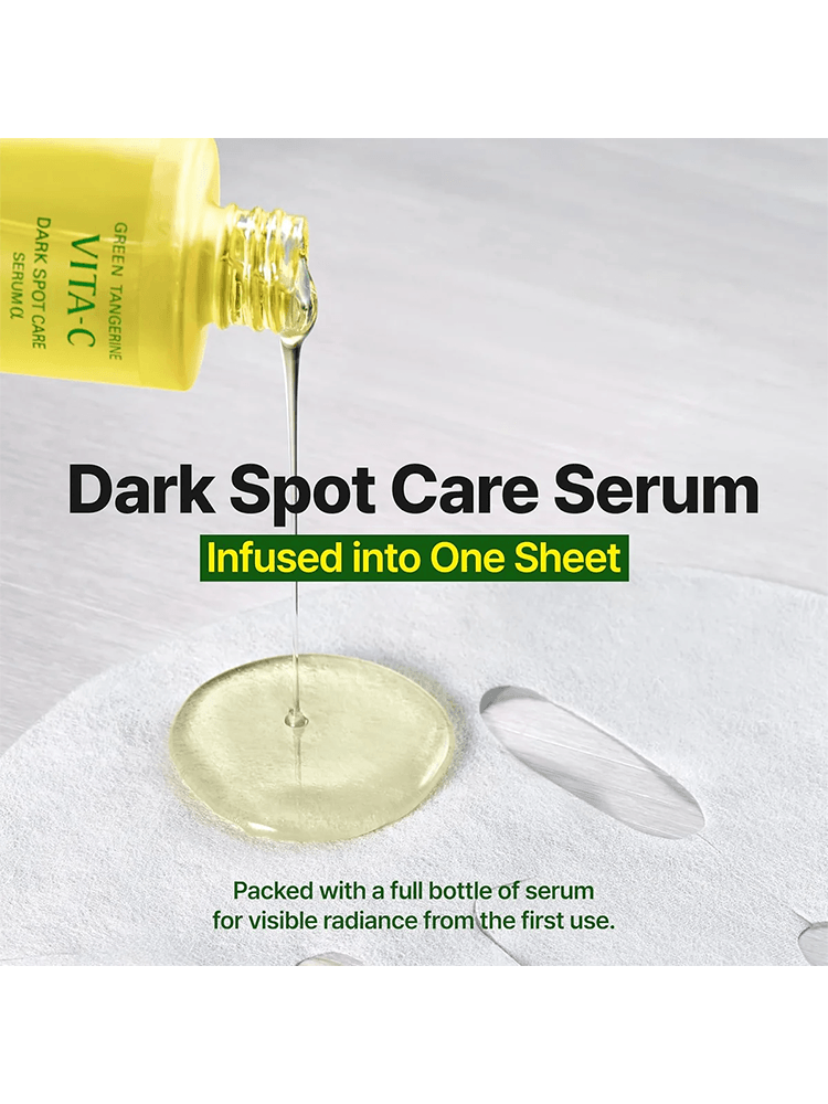 GOODAL Green Tangerine Vita C Dark Spot Care Serum Mask Alpha serum pouring onto a sheet mask for dark spot care.