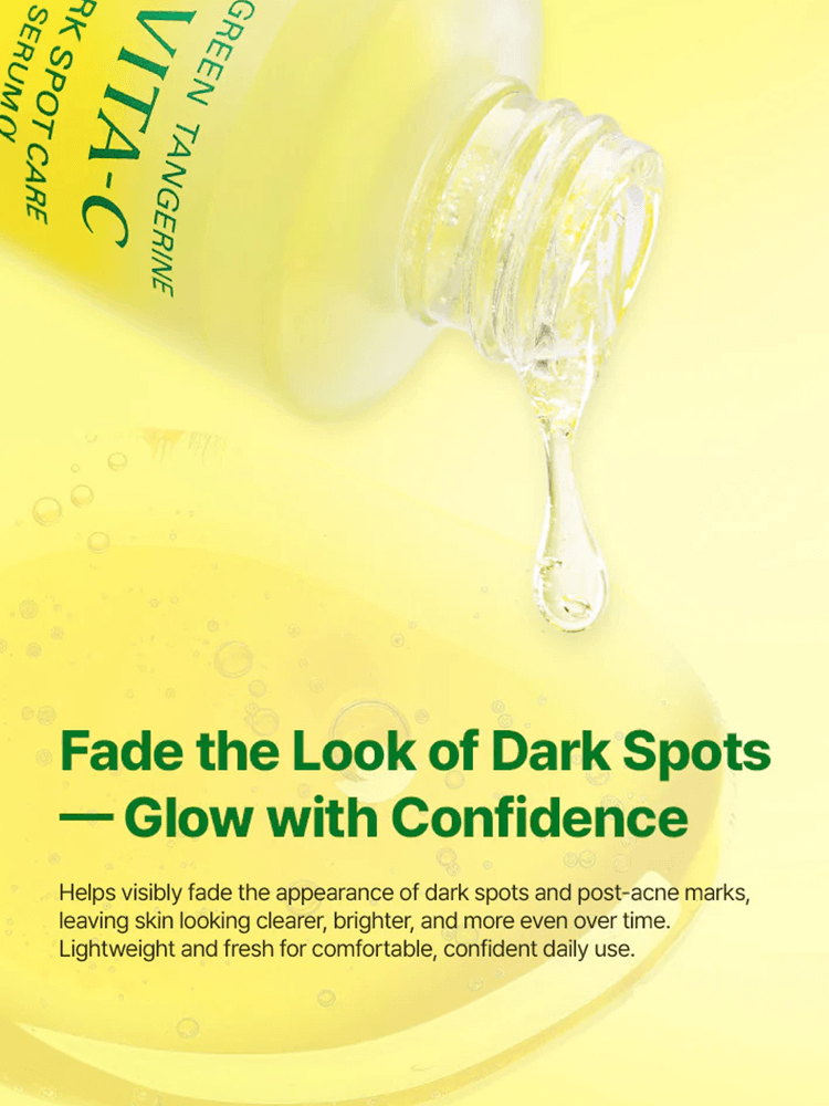 GOODAL Green Tangerine Vita C Dark Spot Care Serum Alpha dripping from bottle with yellow background.