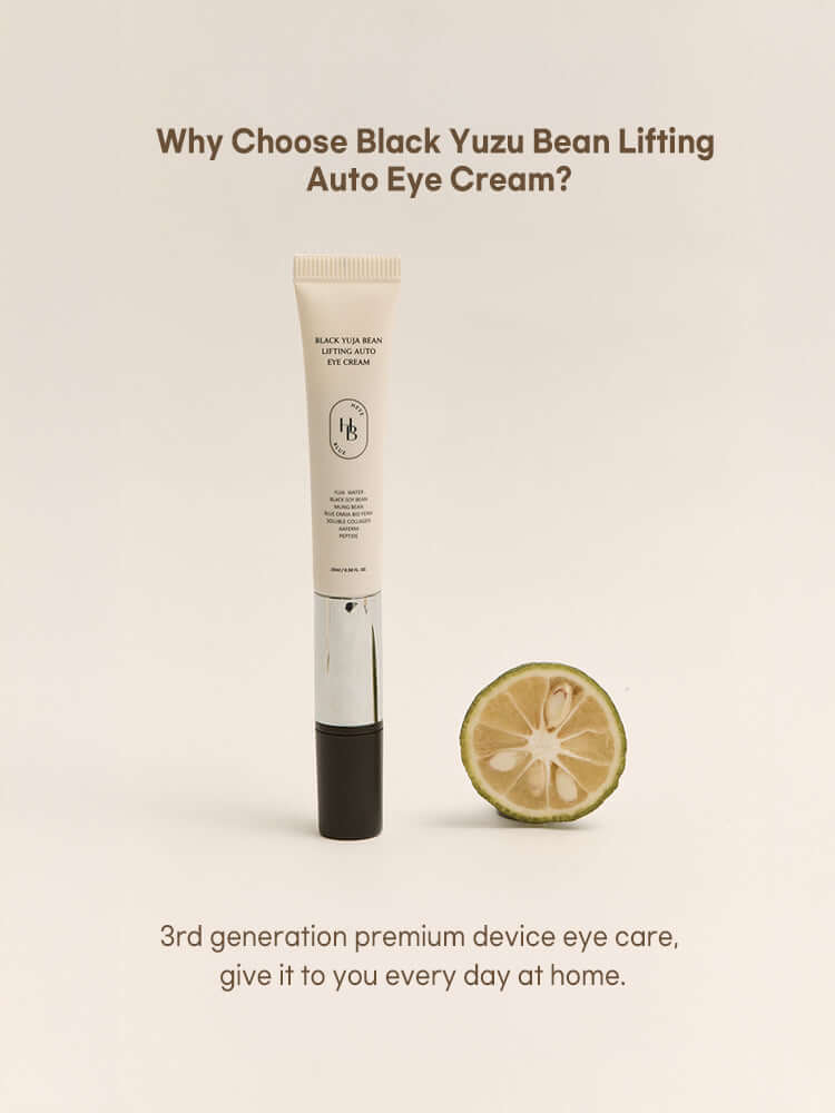 HEVEBLUE Black Yuja Bean Lifting Auto Eye Cream 15ml next to a halved yuzu fruit.