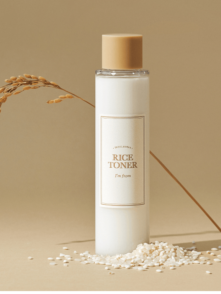 I'M FROM Rice Toner 150ml bottle with rice grains and straw on a beige background.