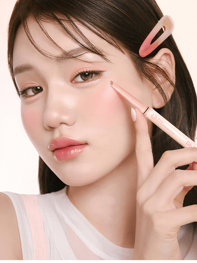 LILYBYRED Smiley Eye Blending Stick Shimmer applied to model's eye, showcasing its creamy texture and precise application.