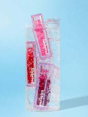 LILYBYRED Juicy Liar Water Tint 4.8g vibrant colors in water, showcasing freshness and playful design.