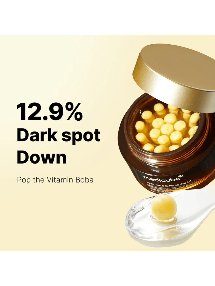 MEDICUBE Deep Vita C Capsule Cream 55g product image with vitamin capsules and highlights on dark spot reduction.
