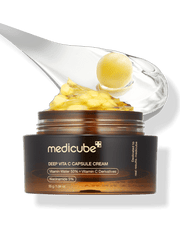 MEDICUBE Deep Vita C Capsule Cream 55g with vitamin capsules and gel texture for brightening and even skin tone.