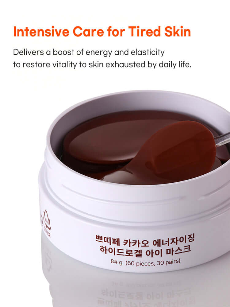 PETITFEE Cacao Energizing Hydrogel Eye patch 84g in a jar with a scoop showcasing revitalizing skincare benefits.