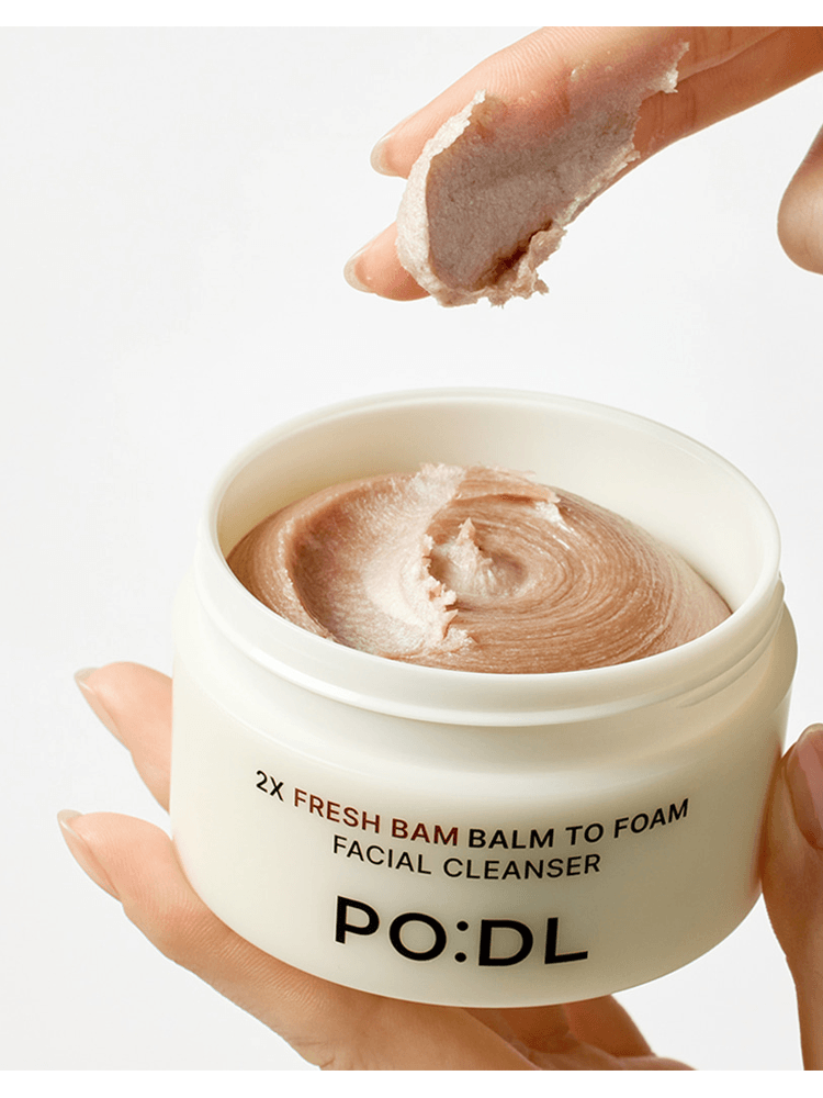 PODL 2X Fresh Bam Balm To Foam facial cleanser in a jar with balm being scooped out.
