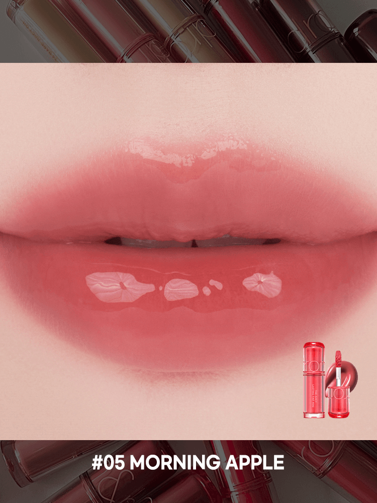 romand The juicy lasting tint in #05 Morning Apple on glossy lips, showcasing a vibrant and fresh finish.