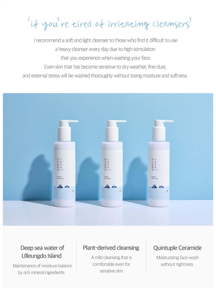 ROUND LAB 1025 Dokdo Cleansing Milk 200ml bottles on a blue background highlighting gentle cleansing.