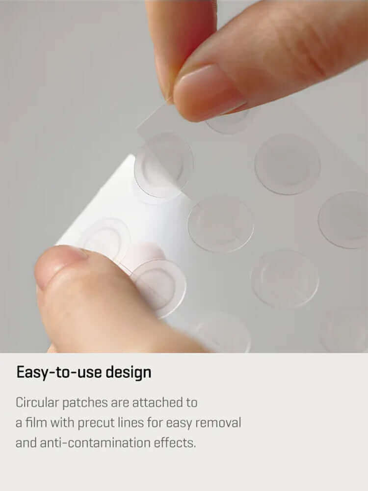 Hand removing hydrocolloid spot patch from protective film, showcasing easy-to-use design and functionality.