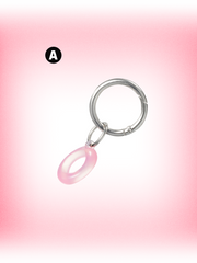 rom&nd Tint ring in pink, featuring a keyring design and a stylish oval charm.