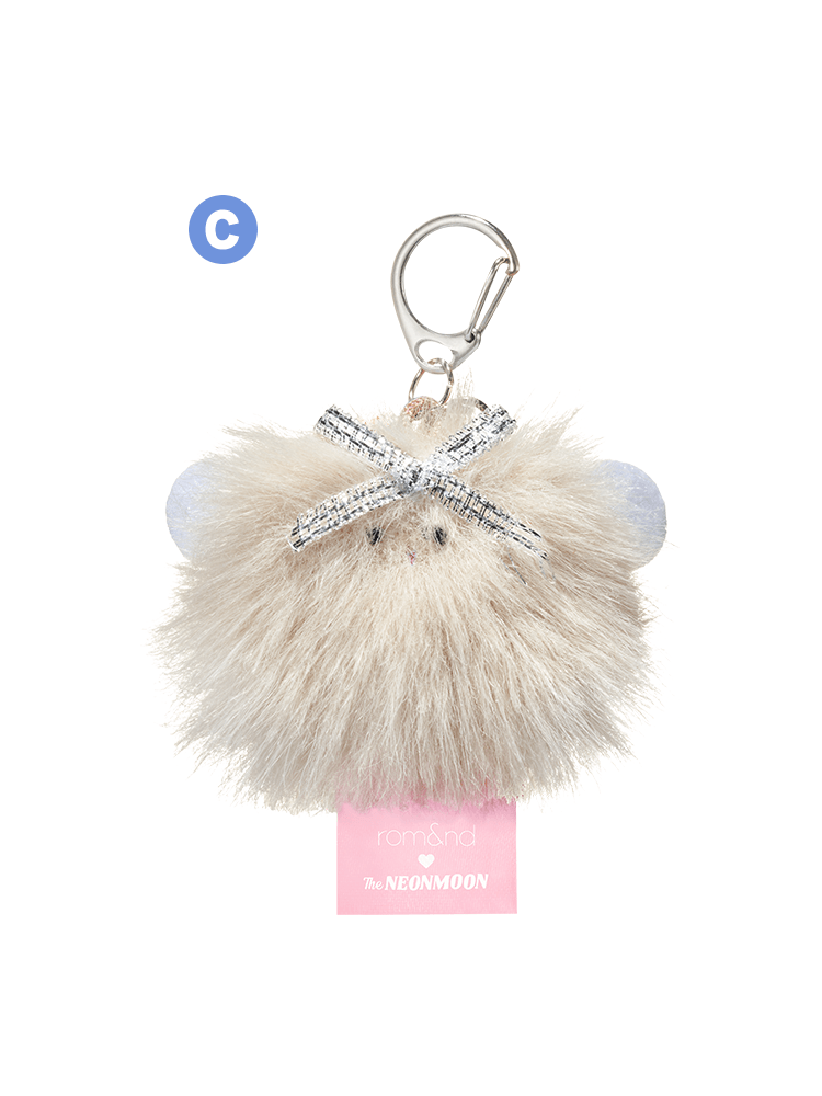 Cute fur keychain featuring the rom&nd Neonmoon doll design with sparkling accents.