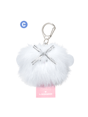 rom&nd Neonmoon doll fluffy keychain accessory with silver accents and a pink tag